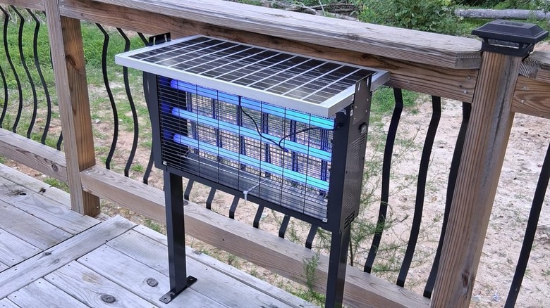 A picture of Coospider-Repta's Heavy-Duty Solar Bug Zapper on a decking