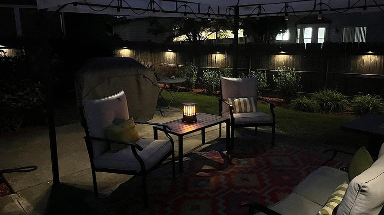 PIC's Solar Bug Zapper on a patio table at night time
