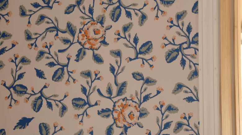 A close up on floral wallpaper with roses
