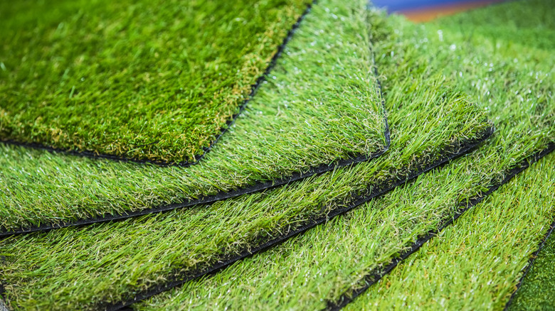 stacks squares of artificial grass