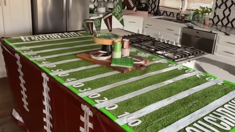 Faux turf as table top with football theme