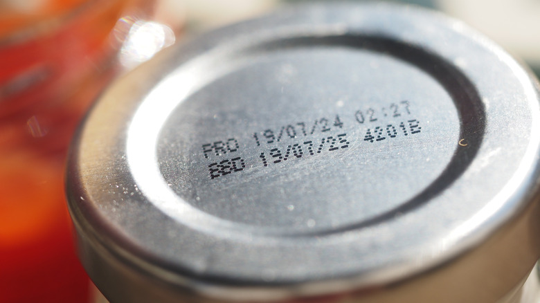 close up of expiration date on top of jar lid