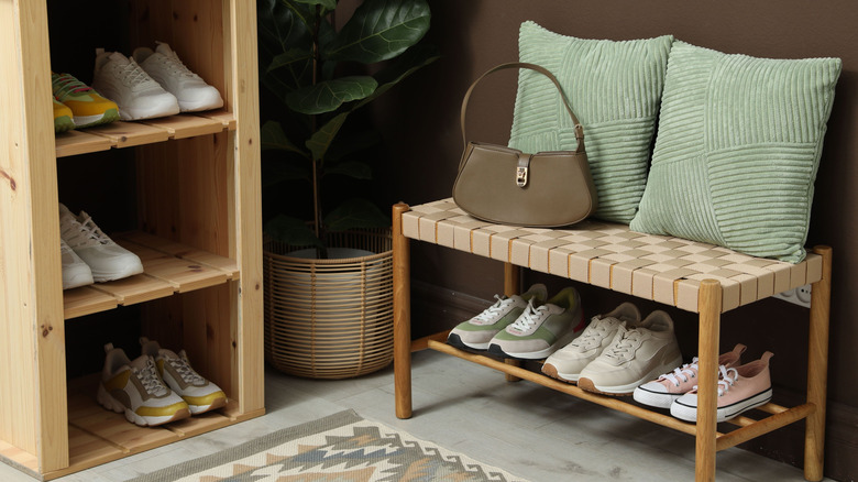 Two shoe racks in an entryway