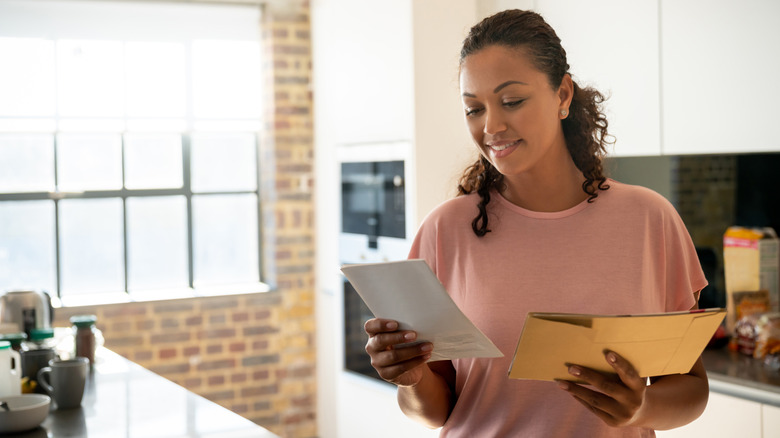 A person going through the mail