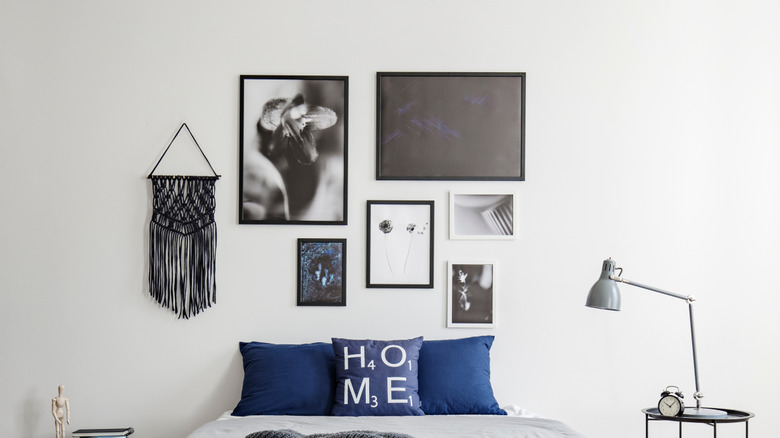 A gallery wall collage including a macrame textile piece