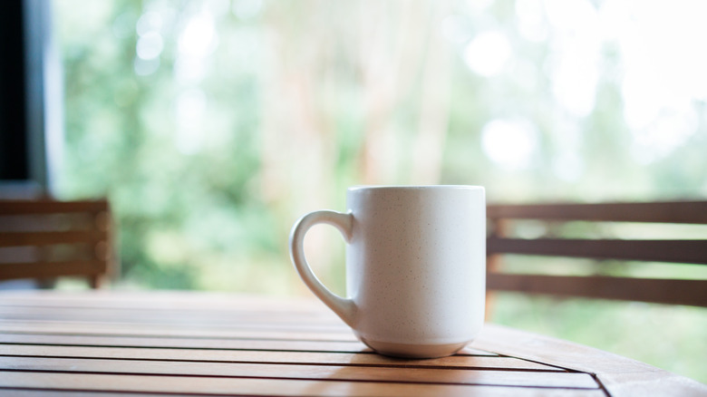 Coffee mug on a wood table