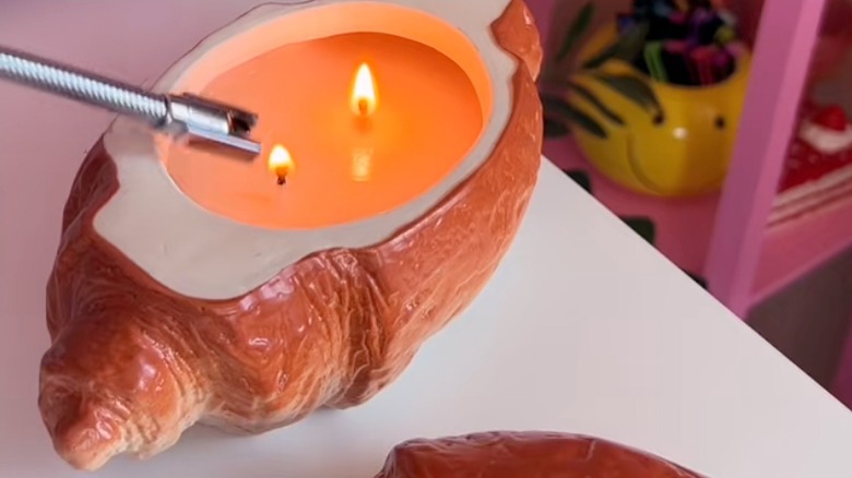 Closeup of a croissant-shaped candle