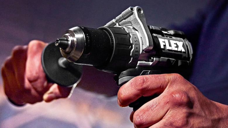 Close-up of a person holding Flex's 24V ½-inch 2-speed Drill-Driver with Turbo Mode