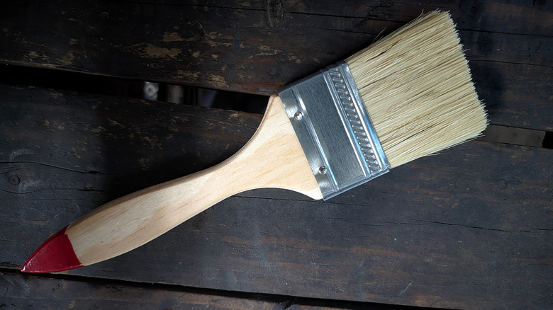 A new wooden-handled paintbrush