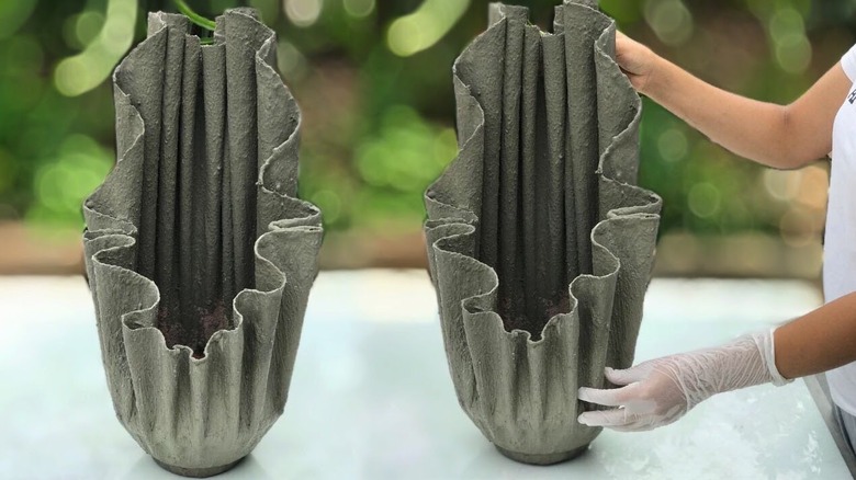 A DIY planter made from cement and old towels