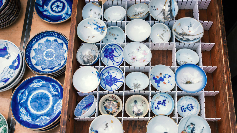 Vintage blue and white dishes on sale table