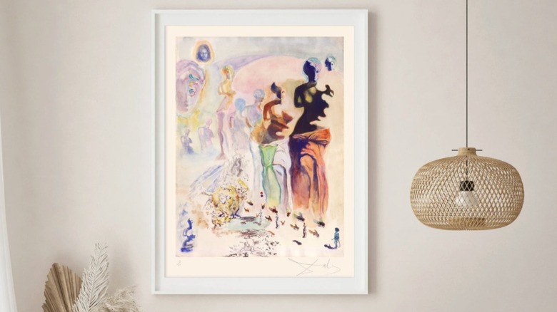 A Salvador Dalí painting hanging on wall.