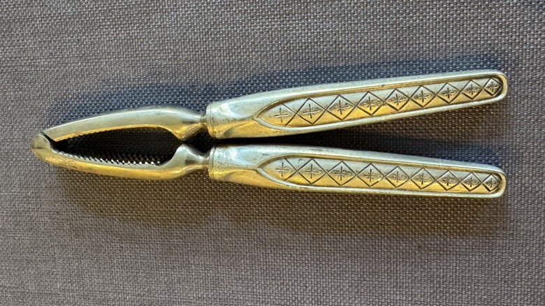 An aerial view of a vintage nutcracker tool