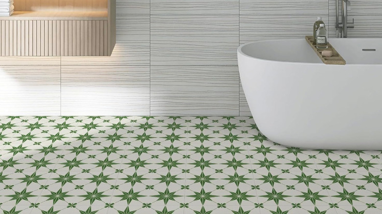 Green and white peel and stick vinyl floors in a bathroom.