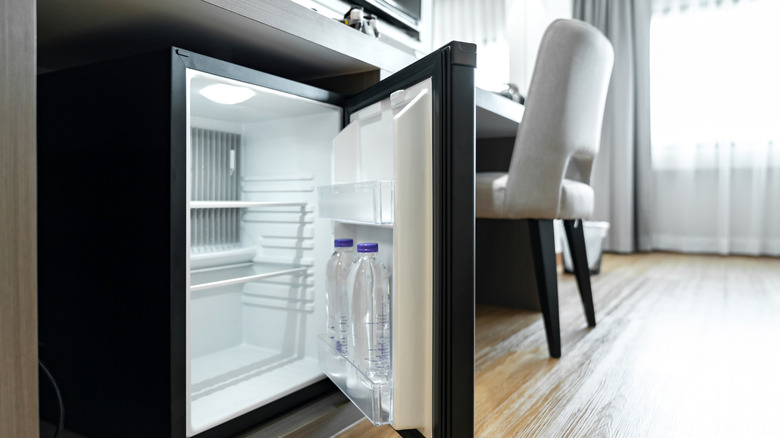 Black mini refrigerator with its door open