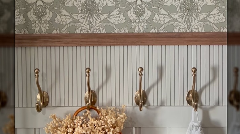 Pole wrap on bottom half of wall in powder room