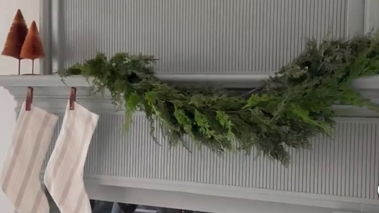 Pole wrap around fireplace painted gray