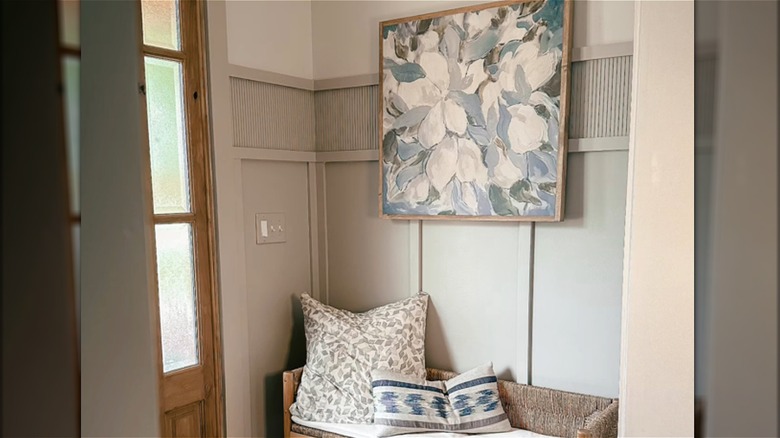 cozy reading nook with pole wrap accent on wall