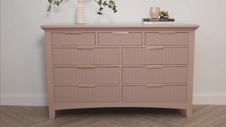 Pole wrap covering drawers on dresser