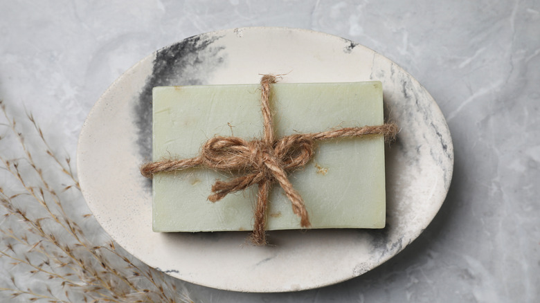 soap on a black and white marble soap dish