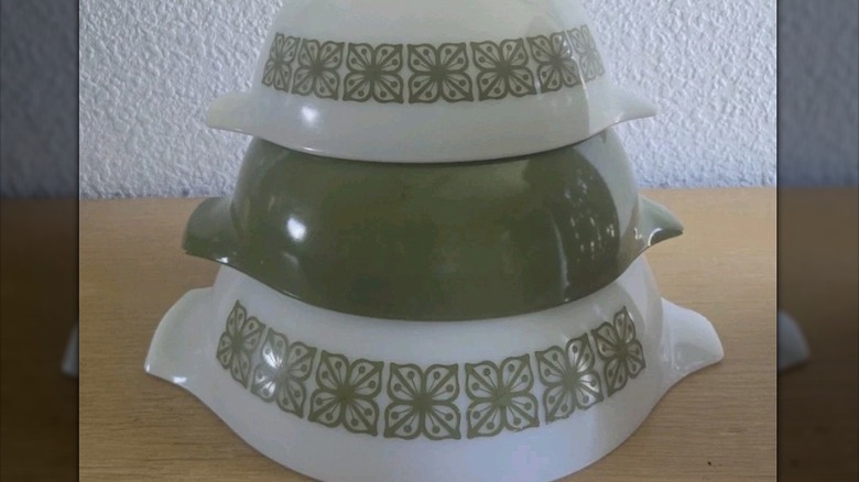 An inverted stacked set of Pyrex Verde Square flowers mixing bowls