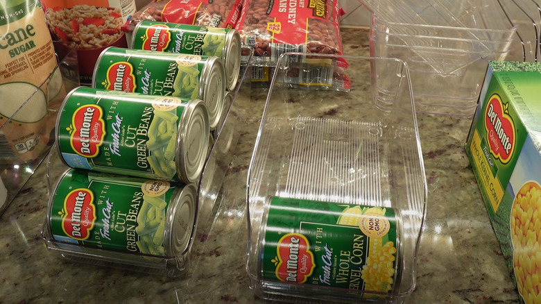 Green bean jars in plastic soda organizer from dollar store
