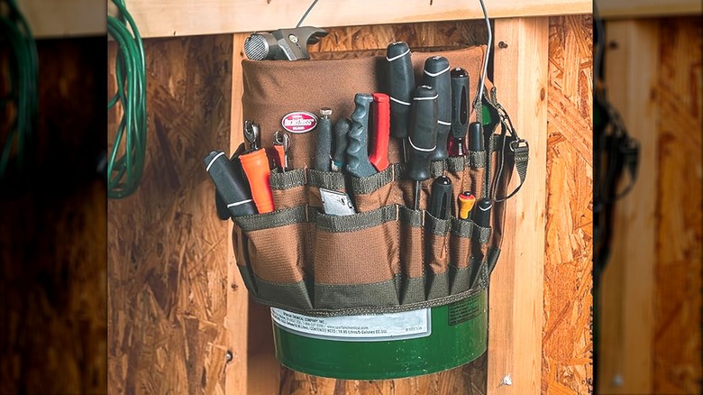Hanging bucket of tools in garage