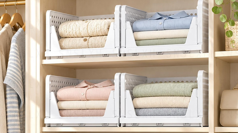 SNSLXH's Closet Organizers holding folded shirts in a wooden closet
