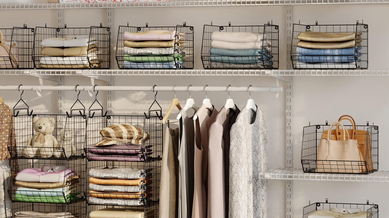 A closet organized with X-cosrack's Closet Hanging Organizer baskets
