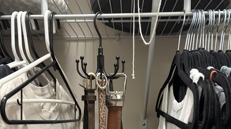 Belts hanging in a closet from ZEDODIER's Belt Hanger