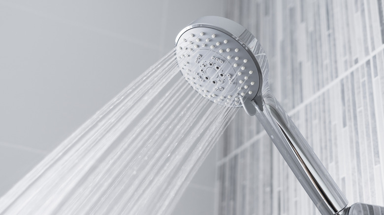 Silver showerhead in shower