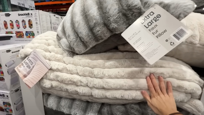 Close-up view of faux fur pillows