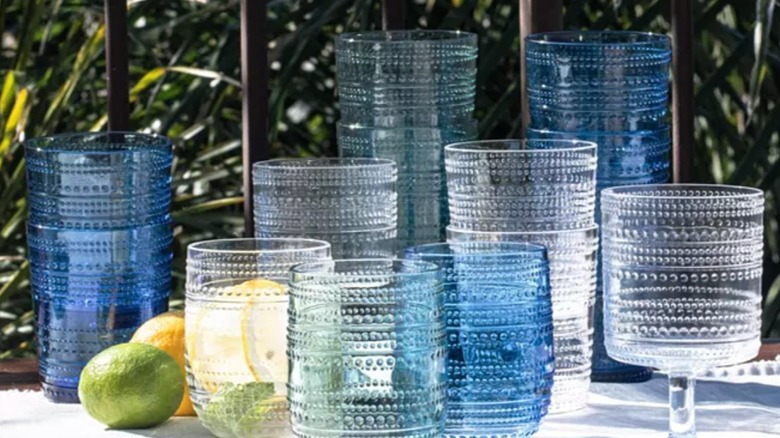 collection of adobe homeware cups sitting on a table outdoors