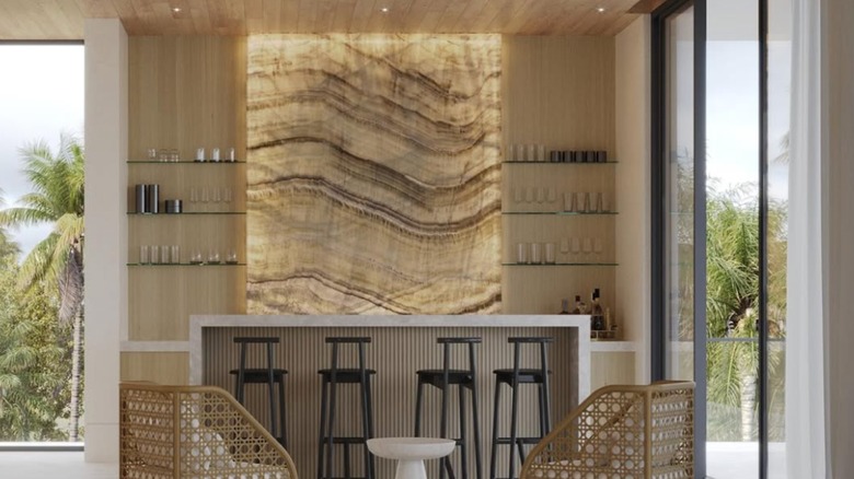 A backlit onyx slab in a modern kitchen