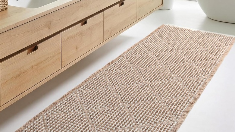 A boho-style waffle rug in a bathroom