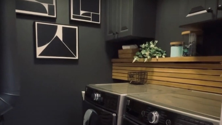 Wooden slat shelf above washer and dryer