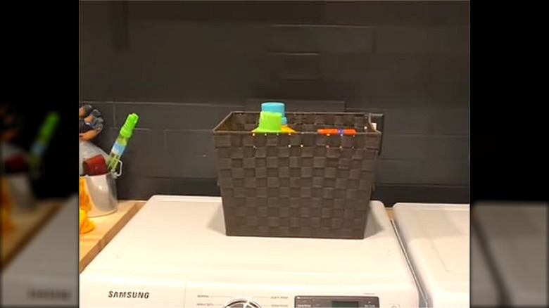Brown woven basket on washing machine