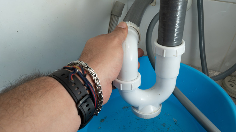 Removing P-trap to clean