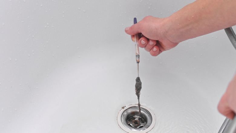 Removing hair from drain