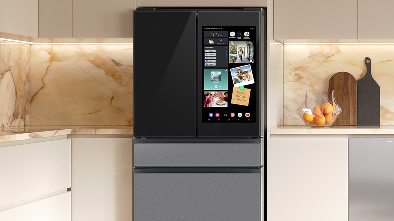 a large screen on the 4-door bespoke fridge