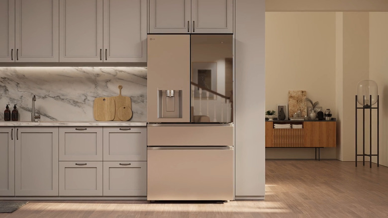 a stainless steel LG fridge in a modern smart kitchen