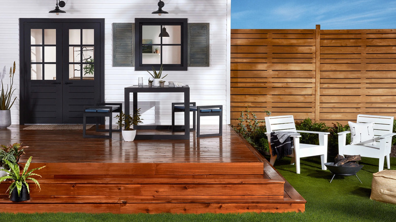 A back deck and fence stained with Cabot exterior stain