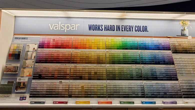 A wall of Valspar brand paint in a store