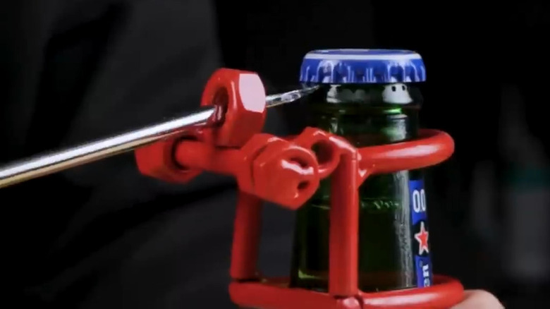 Bottle opener made with nuts and bolts