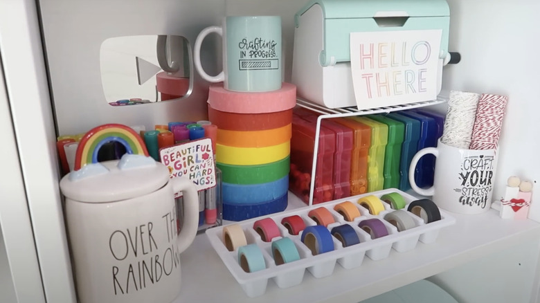 Craft tape stored in an upcycled ice cube tray.