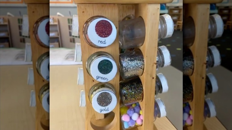 A revolving spice rack repurposed for craft room organization.