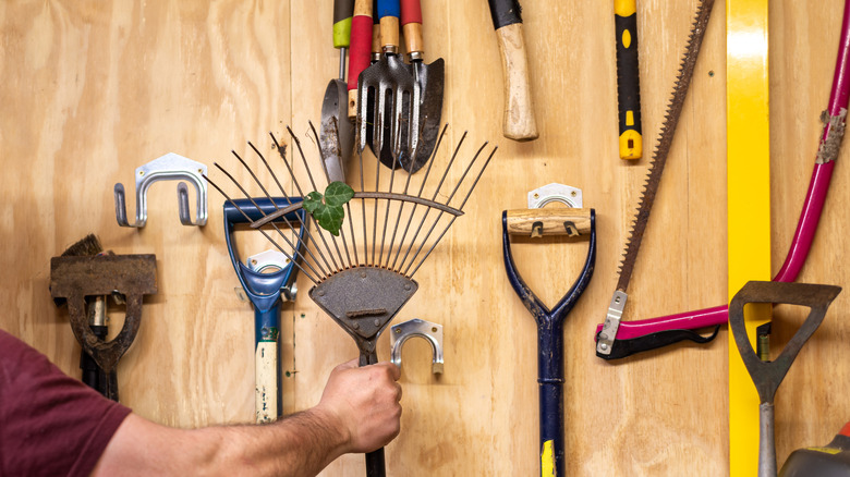 A wall of tools in a garage