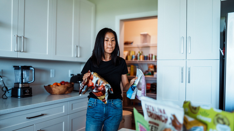 Woman organizing a pantry