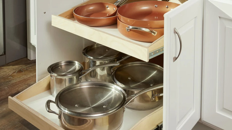 Made-To-Fit Slide-out Shelves for Existing Cabinets by Slide-A-Shelf installed in a white kitchen cabinet