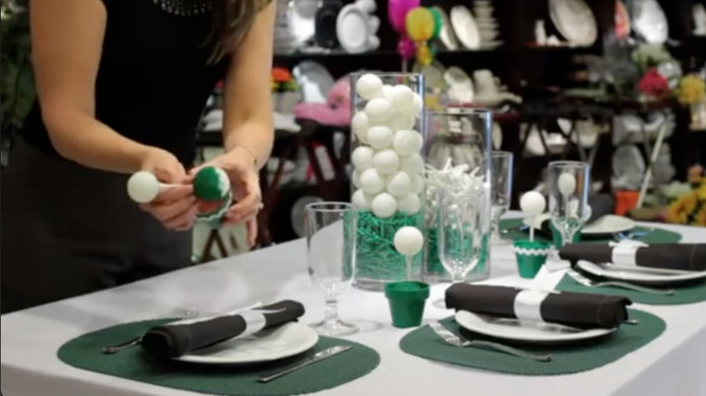 Golf themed table decor with tees on display